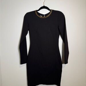 Elegant Black Dress with Gold Accents